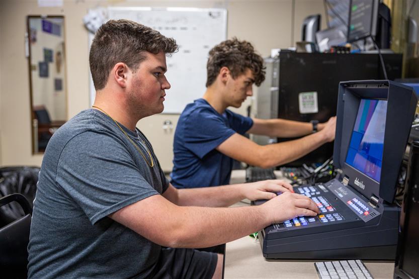 A student works on a sound board
